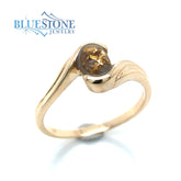 14 Karat Yellow Fashion Ring with an Oval Gold Quartz from the local S